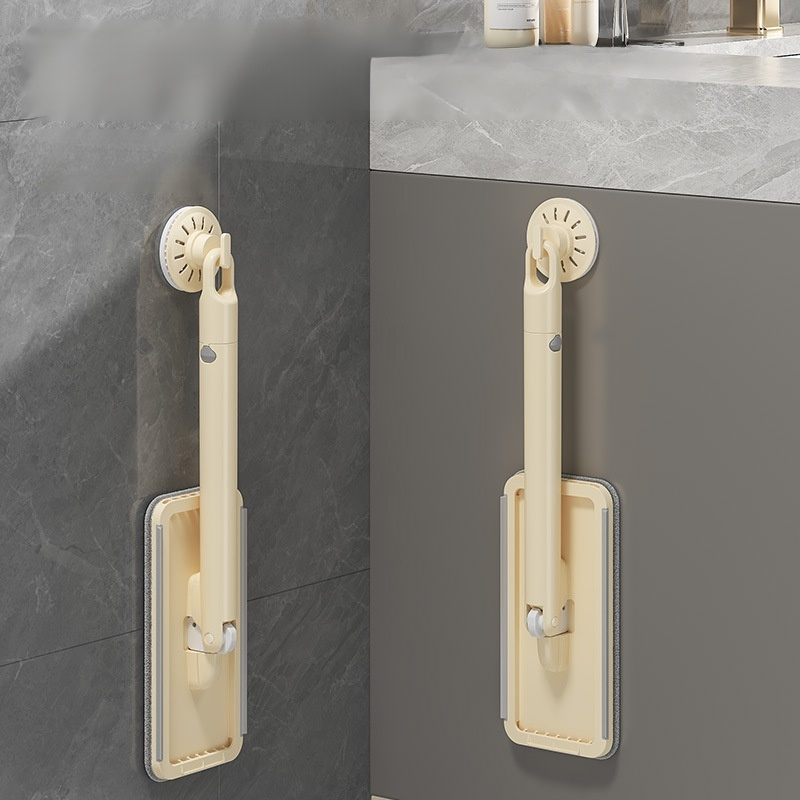 Small desktop mop with automatic clip for cloth